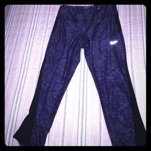 Purple and Black cropped Nike running leggings